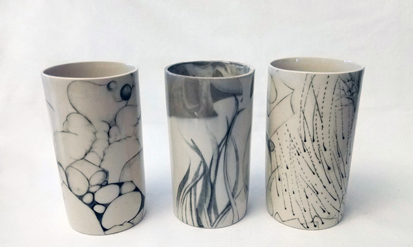 11 Mary Kenny’s three tumblers, to 4 in. (10 cm) in height, porcelain, fired to cone 6 in oxidation, 2018. 
