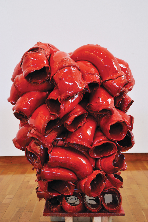 1 Torbjørn Kvasbø’s Tube Forms, Red, 4 ft. (1.2 m) in height, terra-cotta clay, extruded tube elements, white slip, lead-bisilicate based glaze, red stain. Photo: Jørn Hagen.