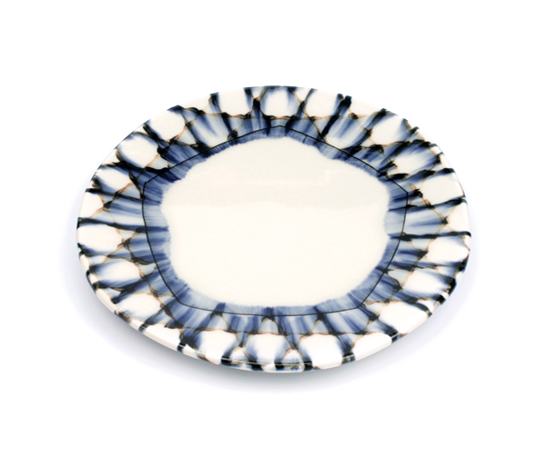 1 Sean O’Connell’s dinner plate, 9 in. (23 cm) in diameter, wheel-thrown porcelain, underglaze, glaze, 2018.