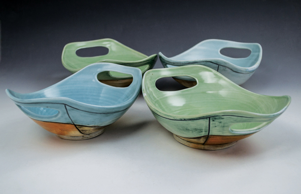 Swoop bowls, thrown and altered porcelain, flashing slip, inlaid underglaze decoration, glaze, soda fired to cone 10.