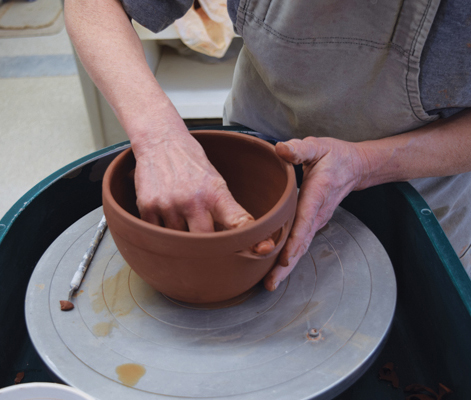 7 Cut a 1½-inch wide slit at each mark, then use a wet finger to push the bottom edge of these slits out from the inside.