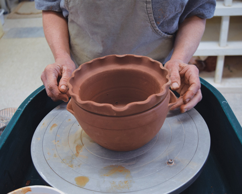 9 Dry the pieces together to prevent warping. Bisque fire, glaze the whole exterior pot and the rim of the interior pot, then glaze fire.