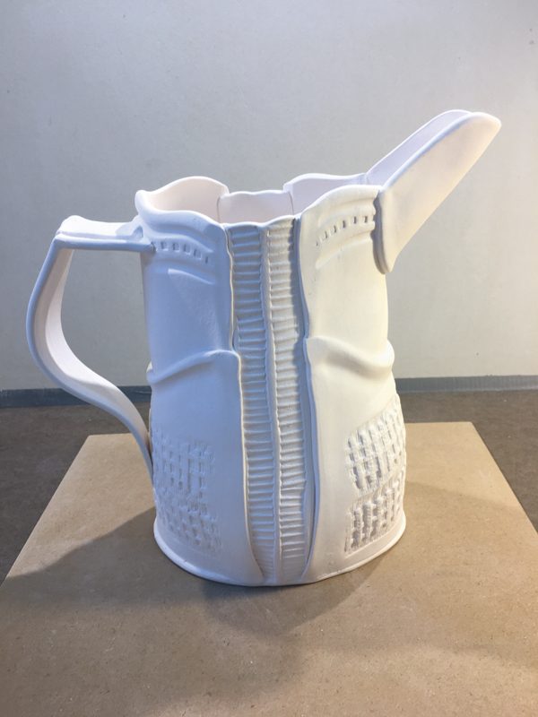 4B Cut handle on a pitcher.