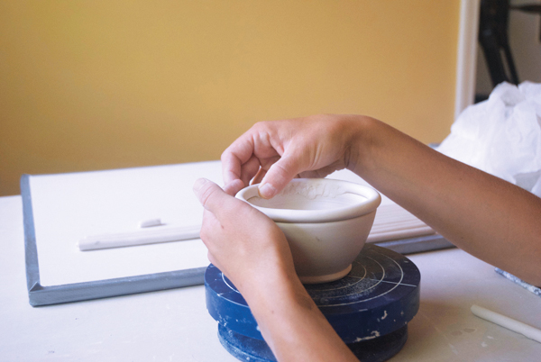 4 Use your thumb to compress the coil downward to the rim of the bowl.
