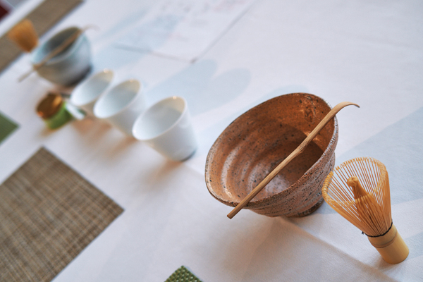 9 Cups, bowls, and utensils needed for making and serving tea. The teabowl in the foreground was made by Kohei Nakamura. Photo: Douglas Dubler.