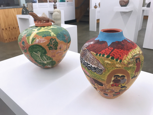 8 Installation view of the “Clay Stories: Contemporary Indigenous Ceramics from Remote Australia” exhibition at Jam Factory’s satellite location in Seppeltsfield. Pots by Rahel Kngwarria Ungrwanaka: Tjwanpa (left), Kurrkurrka (Boobook Owl) (right).