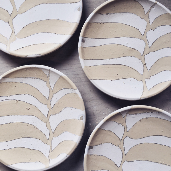 8 Finished decorated plates prior to firing.