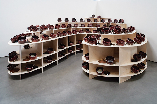6 Sonoma Ash Project (installation views), 12 ft. (3.6 m) in width, 112 porcelain vessels with lids, (wood display by 180 Studios, Santa Rosa, CA), 2018. Courtesy of the Museum of Sonoma County. Photo: Douglas Sandberg.
