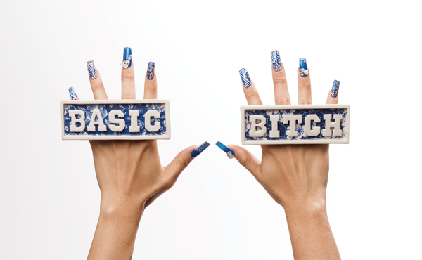 1 Jennifer Ling Datchuk’s Basic Bitch, print: 4 ft. (1.2 m) in length, rings: slip-cast porcelain, blue and white nails, 2017. Photo: Ansen Seale.