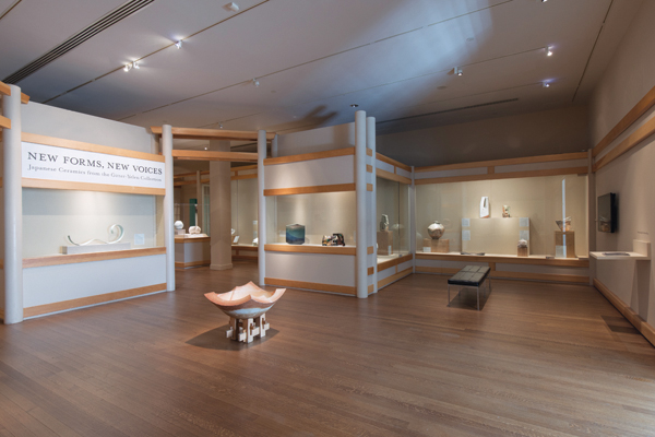 1 Exhibition view of New Forms New Voices, Japanese Ceramics from the Gitter-Yelen Collection at NOMA. Foreground: Ryuichi Kakurezaki's fish bowl in the Shigaraki style, 39 in. (99 cm) in height, 1999–2000. Left-hand glass case: Satoshi Kino’s Fall Wind 16-32, 34 5/8 in. (87 cm) in diameter, Seihakiju glazed porcelain, 2014. Courtesy of New Orleans Museum of Art. Photo: Roman Alokhi. 
