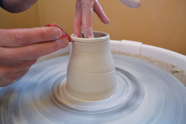 2 Leave extra clay at the top of the creamer to assist in forming a spout.
