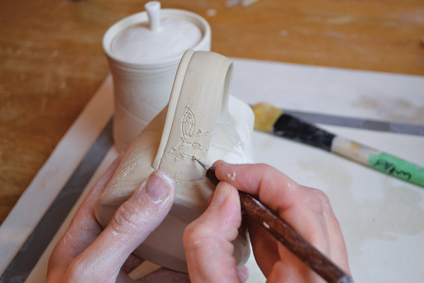 8 Carve loose, spontaneous lines into the clay surface using a stylus or pin.
