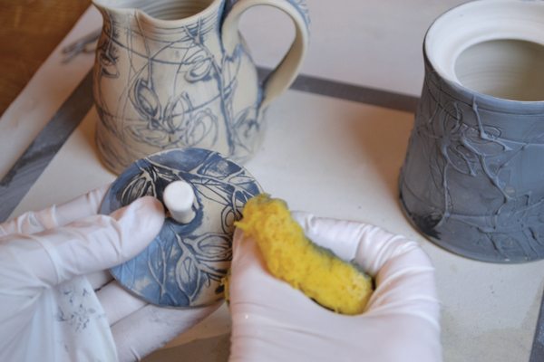 11 Wipe back the underglaze, revealing the carved and trailed lines.