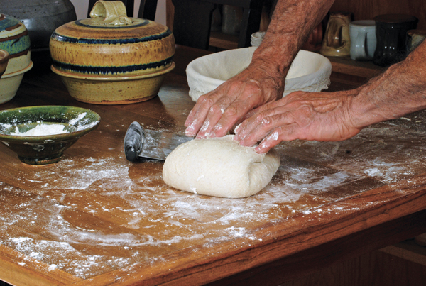 15 Repeat the stretching and folding to form a loaf.