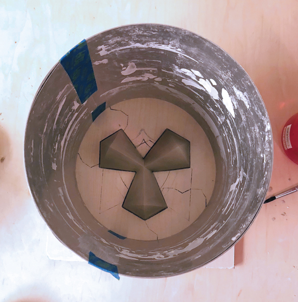 6 Use aluminum flashing to contain the plaster once it is poured onto the prototype.