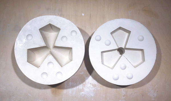 9 First and second mold parts created for the tile.