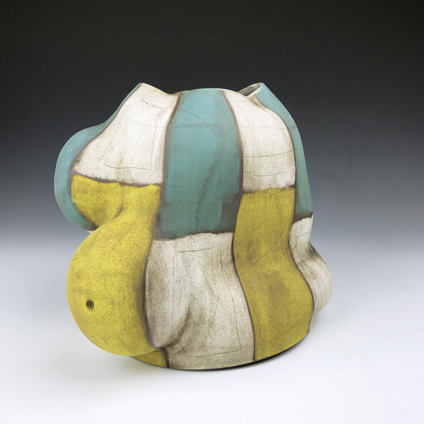 2 José Sierra and Mark Arnold’s vase, 10½ in. (27 cm) in height, handbuilt dark brown stoneware, AMACO underglaze, 2018. Photo: Mark Arnold.