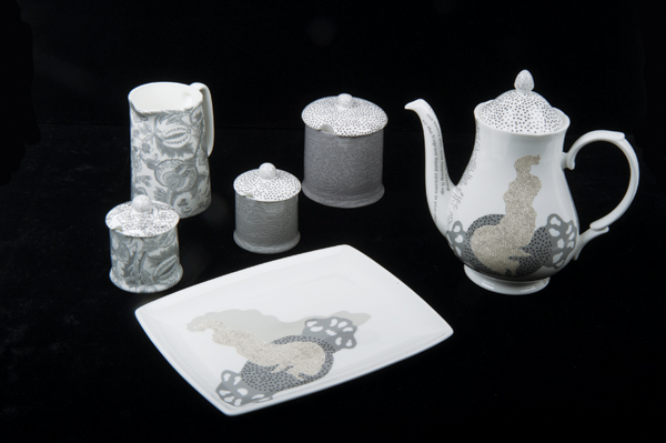 1 Charlotte Hodes’ After the Taking of Tea; coffee pieces, varying dimensions, hand-cut enamel transfer on china, 2018. Photo: The Bowes Museum. 