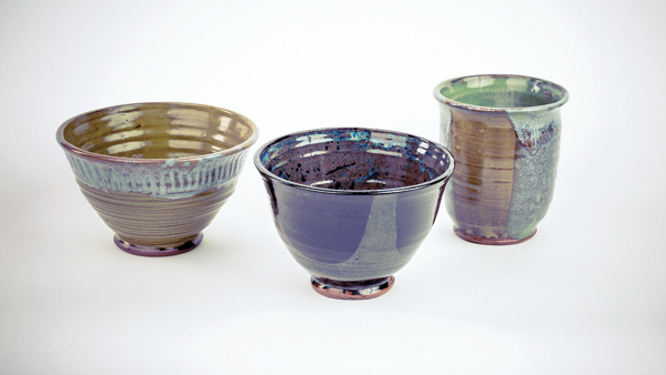 3 Kelly Brinkmann’s wheel-thrown strawberry bowls (named for their silhouette) and utensil jar, photographed during the group’s photo lesson. Photo: Chimera Creative Works.