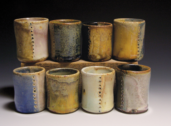 6 Laurel MacDuffie’s tumblers, 4 in. (10 cm) in height, stoneware, salt fired to cone 10, 2018.