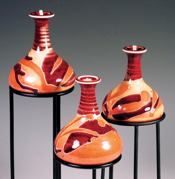 3 Robert Reiberg’s oil candles, 8 in. (20 cm) in height, porcelain, fired to cone 10. Robert Reiberg is a stage-3 seller; his primary profession is making and selling ceramics throughout the Midwest and online.