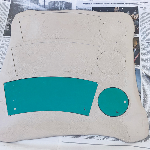 2 Use templates to cut out your desired shapes from the textured clay slab.