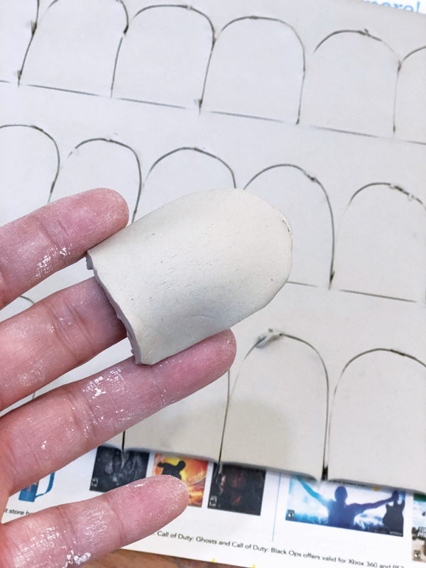 4 To make the thimble handle, cut out and curve dome shapes over your finger.