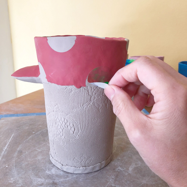 12 Once the underglaze layer becomes dull, remove the stickers to reveal the pattern.