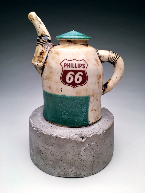 2 Michael Schmidt’s Phillips 66 Oil-Can Teapot, 11 in. (28 cm) in height, white stoneware, fired to cone 6 in oxidation, decals, cast Gypsolite, 2018. 