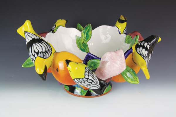 2 Farraday Newsome’s Dark Blue Bowl with Oranges, Birds and Shells, 16 in. (41 cm) in diameter, terra cotta, glaze, 2017. 