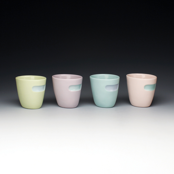  9 Double-walled whiskey sippers, 41/2 in. (11 cm) in height, stained porcelain casting slip, glaze, 2018. 
