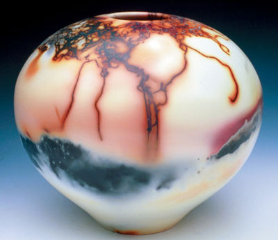 https://ceramicartsnetwork.org/images/default-source/uploadedimages/wp-content/uploads/2019/03/saggar-fired-orb.jpg?sfvrsn=37a1cc79_0