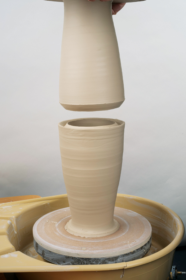 1 To join the cylinders, form a V-shaped groove in the lower rim and a V-shaped point over the upper rim.