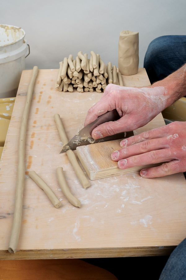 4 Roll coils to about ⅜–½ inch thick, then cut to size based on the height of the cylinder and the width of your paddle.