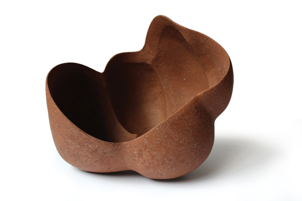 2 Divided vessel, 13 in. (33 cm) in width, native Minnesota clays and minerals, unglazed, fired to cone 5 in oxidation, 2018. 