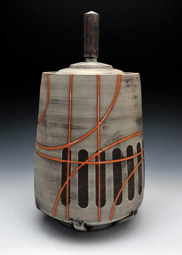 2 Lidded jar, 12 in. (30 cm) in height, dark stoneware, terra sigillata, glaze, fired to cone 5 in an electric kiln, 2018. 