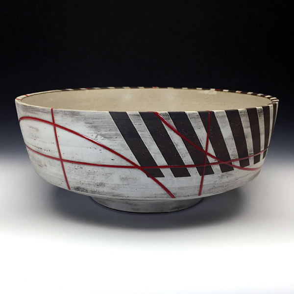 1 Eric Heerspink’s large bowl, 11 in. (28 cm) in diameter, dark stoneware, terra sigillata glaze, fired to cone 5 in an electric kiln, 2018.