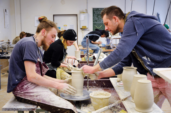 7 Students shown working today in the same wheel-throwing classroom as shown in image 2. Photo: Courtesy of Keramikschule Landshut. 