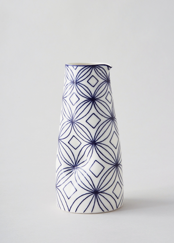 2 Frangipani Dimple Jug, 6 in. (15 cm) in height, wheel-thrown and hand-painted porcelain. Photo: Yeshen Venema.