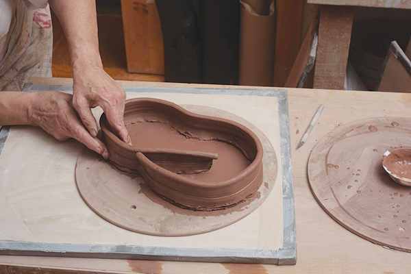 4 Apply slip and attach the base and sides of the tray when the clay is at a soft leather-hard stage.