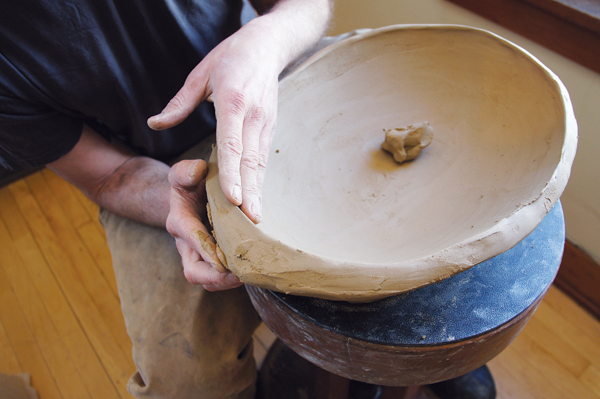 9 Compress the rim, adding clay as needed to even out the thickness and to create a point on the narrow end of the oval.