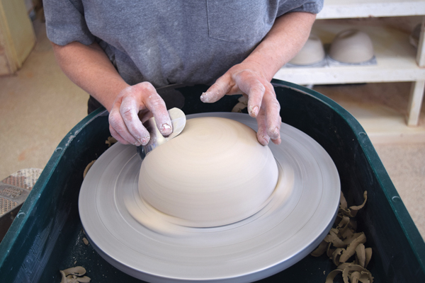 2 Lightly trim all 3 bowls. Trim the third bowl round and smooth on the bottom.