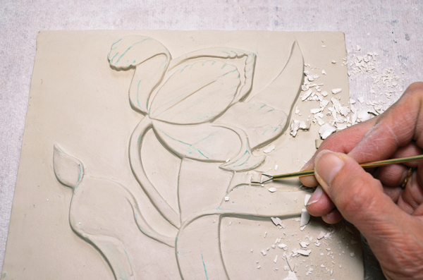 7 To transition from a 2D to a 3D bas-relief, excise the background and edges. 