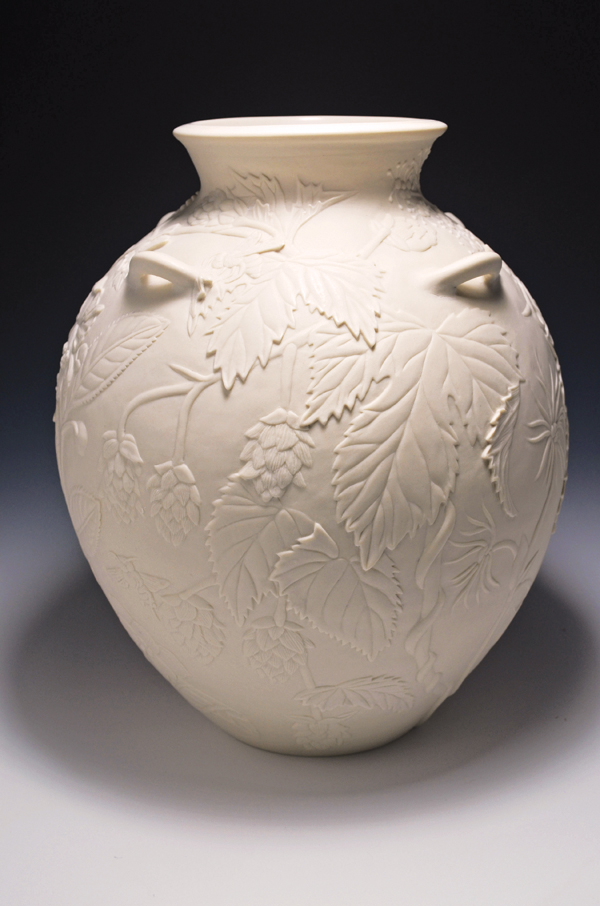 Quenched series vessel, wheel-thrown porcelain, carved and hand polished, fired to cone 6 in an electric kiln.