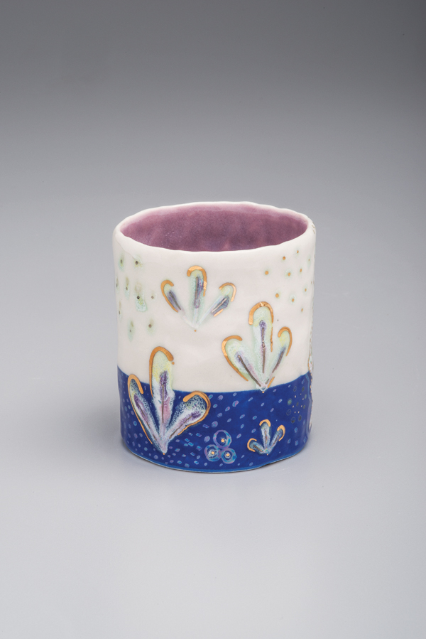 8 A fired Funky pattern cup with luster added followed by a third firing.