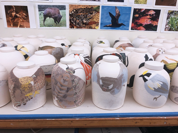 8 Worktable in Julia Galloway’s studio with glazed urns ready for the kiln.