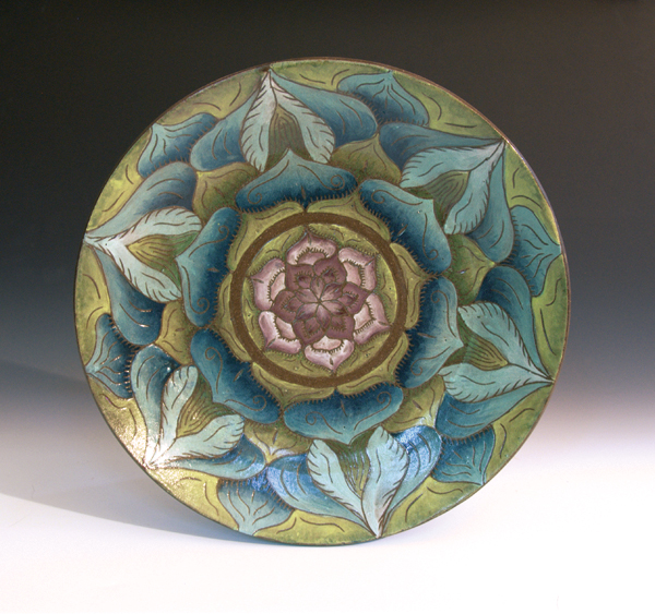 5 Nancy Sowder’s turquoise tray, 11 in. (28 cm) in diameter, mid-range stoneware, commercial underglazes, sgraffito, commercial glazes, fired in a electric kiln, 2019.
