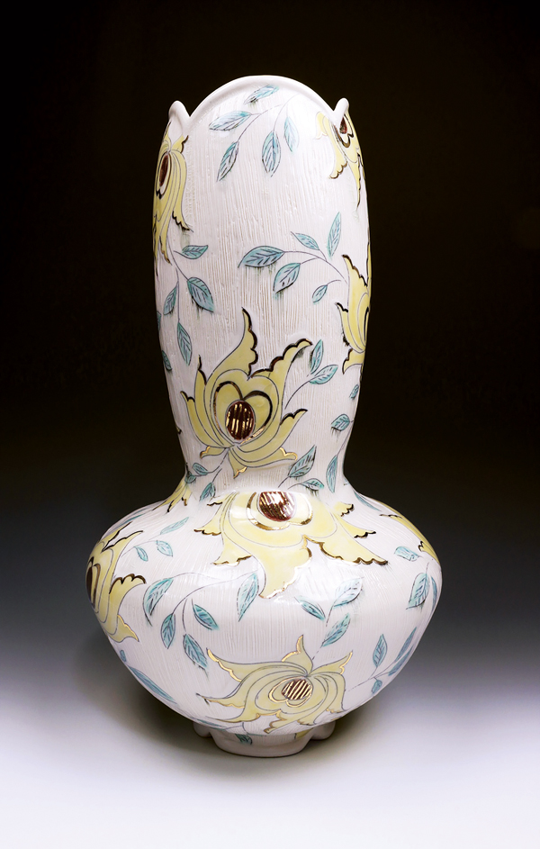 8 Stephanie Wilhelm’s yellow floral vase, 15 in. (38 cm) in height, wheel-thrown and altered porcelain, hand painted, wax resist, fired to cone 6, gold luster, 2019. 