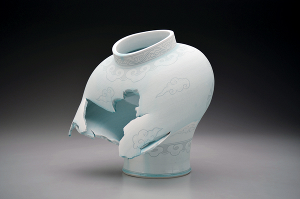 1 Steven Young Lee’s Jar with Tiger and Clouds, 16 in. (41 cm) in height, porcelain, white slip, glaze, 2019.