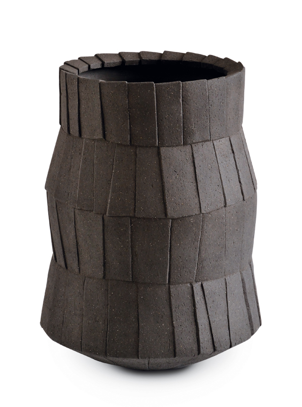 3 Faceted vessel, 10 in. (25 cm) in height, wheel-thrown stoneware, carved, fired to cone 6 in an electric kiln. 